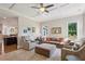 Spacious living room with coffered ceilings, neutral tones, and open access to other rooms at 3909 Obryant Se Cir, Smyrna, GA 30082