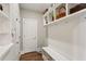 Mudroom with built-in storage, bench, and hooks for organized entryway at 3909 Obryant Se Cir, Smyrna, GA 30082