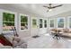 Sunroom featuring lots of natural light, neutral paint, and a relaxing seating area at 3909 Obryant Se Cir, Smyrna, GA 30082