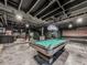 Basement pool table room with painted walls and exposed ductwork, including a billiards table and built-in seating at 646 Darlington Ne Cir, Atlanta, GA 30305