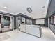 Finished basement with a projector screen, a modern sectional, and decor for comfortable entertaining at 646 Darlington Ne Cir, Atlanta, GA 30305