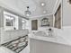 Elegant bathroom featuring a soaking tub, vanity, and stylish decor at 646 Darlington Ne Cir, Atlanta, GA 30305