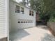 Spacious two-car garage with an overhead door and plenty of driveway parking space at 646 Darlington Ne Cir, Atlanta, GA 30305