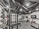 Home gym features state-of-the-art exercise equipment, rubber flooring, and plenty of natural light at 646 Darlington Ne Cir, Atlanta, GA 30305