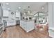 Bright, open kitchen with a large island, modern appliances, eat-in breakfast nook and seamless connection to other living areas at 646 Darlington Ne Cir, Atlanta, GA 30305