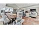 Spacious open-concept featuring kitchen, dining, and living spaces with hardwood flooring at 646 Darlington Ne Cir, Atlanta, GA 30305