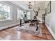 Home office with hardwood floors, natural light, and decorative light fixture and unique wall decorations at 646 Darlington Ne Cir, Atlanta, GA 30305