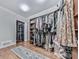 A bright walk-in closet with built-in shelving and racks, providing ample storage at 646 Darlington Ne Cir, Atlanta, GA 30305