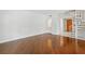 Spacious living room featuring hardwood floors and staircase at 1130 Piedmont Ne Ave # 402, Atlanta, GA 30309