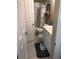 Small bathroom featuring a white vanity, toilet, bathtub, and shower with a curtain, optimizing space efficiency at 1450 Liberty Ln, Cumming, GA 30040