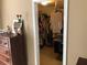 View of a walk-in closet with clothing racks and shelves, offering ample storage space at 1450 Liberty Ln, Cumming, GA 30040