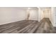 Finished basement with sleek flooring and staircase is ready for your personal touches at 1749 W Caribaea Se Trl, Atlanta, GA 30316