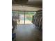 Spacious garage with visible access to the driveway and clothing rack, offering a variety of storage at 222 Yardsley Dr, Mcdonough, GA 30253