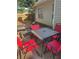Outdoor patio with a table and chairs, perfect for enjoying a meal or relaxing in the backyard at 222 Yardsley Dr, Mcdonough, GA 30253