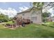 Beautiful backyard with a brick patio and deck, perfect for outdoor gatherings at 3574 Timberloch Trl, Snellville, GA 30039