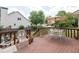 Wooden deck featuring outdoor seating and decor with a lush green backdrop at 3574 Timberloch Trl, Snellville, GA 30039
