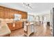 Spacious kitchen featuring wood cabinets, stainless appliances, and tile flooring at 3574 Timberloch Trl, Snellville, GA 30039