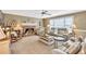 Inviting living room with a brick fireplace, plush seating, and natural light at 3574 Timberloch Trl, Snellville, GA 30039