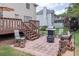 Brick patio complete with a grill, fire pit, and comfortable seating at 3574 Timberloch Trl, Snellville, GA 30039