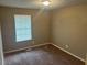 Bedroom features neutral walls, carpet and a window at 3674 Riverchase Ter, Decatur, GA 30034