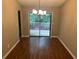 Modern dining area with hardwood floors and access to the outdoor deck at 3674 Riverchase Ter, Decatur, GA 30034