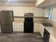 Well-equipped kitchen with stainless steel appliances, and sleek cabinets at 3674 Riverchase Ter, Decatur, GA 30034