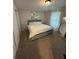 Cozy bedroom with a large bed and mirrored closet at 2351 Carver Nw Dr, Atlanta, GA 30314