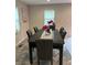Charming dining room with black table and seating for six at 2351 Carver Nw Dr, Atlanta, GA 30314
