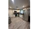 Bright kitchen with white cabinets, granite counters, and stainless-steel appliances at 2351 Carver Nw Dr, Atlanta, GA 30314