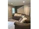 Inviting living room with a large sectional sofa and neutral decor at 2351 Carver Nw Dr, Atlanta, GA 30314