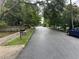 Peaceful neighborhood street with mature trees and well-kept homes creating a serene and inviting atmosphere at 2351 Carver Nw Dr, Atlanta, GA 30314