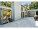 Exterior of home boasts a spacious deck with a pergola, perfect for entertaining at 3185 Country Club Nw Ct, Kennesaw, GA 30144