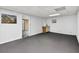 Basement area with gray carpeting, white walls, recessed lighting, and a mini refreshment center at 3185 Country Club Nw Ct, Kennesaw, GA 30144