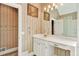 Bathroom featuring wallpaper, vanity and shower at 3185 Country Club Nw Ct, Kennesaw, GA 30144