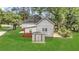 Backyard view features the exterior with utility shed at 3961 Jodeco Rd, Mcdonough, GA 30253