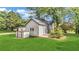 Exterior rear view with utility shed at 3961 Jodeco Rd, Mcdonough, GA 30253