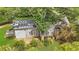 Exterior rear view with partial tree coverage at 3961 Jodeco Rd, Mcdonough, GA 30253