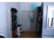 Walk-in closet with ample storage space for clothes and shoes, featuring hardwood flooring at 3961 Jodeco Rd, Mcdonough, GA 30253