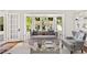 Comfortable living room area with bay window, neutral color scheme, and stylish decor at 54 Camden Ne Rd, Atlanta, GA 30309