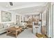 Open concept living room and kitchen area with comfortable seating and lots of natural light at 54 Camden Ne Rd, Atlanta, GA 30309