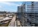 Exterior view of a modern apartment building featuring sleek design, multiple balconies, and urban living at 788 W Marietta St # 1809, Atlanta, GA 30318