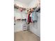 Organized walk-in closet featuring shelving for clothing, shoes, and accessories providing ample storage at 788 W Marietta St # 1809, Atlanta, GA 30318