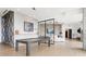 Spacious game room with a pool table, modern lighting, and a stylish lounge area at 788 W Marietta St # 1809, Atlanta, GA 30318