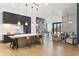 Expansive living area with modern kitchen, fireplace, and luxurious seating, perfect for entertaining at 788 W Marietta St # 1809, Atlanta, GA 30318