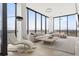 Bright and spacious living room with stylish furniture, floor-to-ceiling windows, and a cozy layout at 788 W Marietta St # 1809, Atlanta, GA 30318