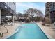 Community pool with modern lounge chairs and cabanas for relaxation and leisure at 788 W Marietta St # 1809, Atlanta, GA 30318