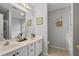 Dual vanity in Primary bathroom with separate tub and shower at 335 Lee Miller Ct, Suwanee, GA 30024