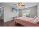 Spacious bedroom featuring a ceiling fan, and hardwood floors at 335 Lee Miller Ct, Suwanee, GA 30024