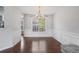 Dining room with natural light and hardwood floors at 335 Lee Miller Ct, Suwanee, GA 30024