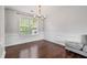Dining room with natural light and hardwood floors at 335 Lee Miller Ct, Suwanee, GA 30024